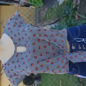 Pink and black shirt with small roses